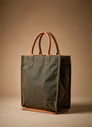 Olive waxed canvas tote with tan leather handles