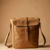 Tan vegetable-tanned leather messenger bag